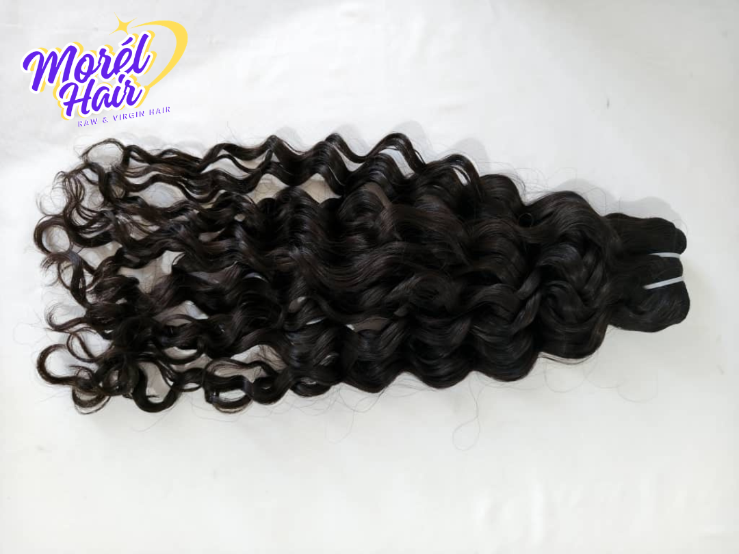 Black curly hair extensions on a white background with Morél Hair logo.